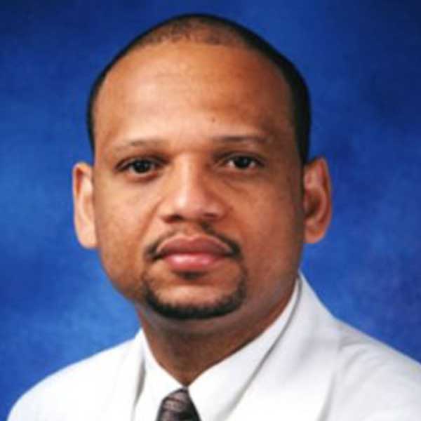 Dr. Angelo Gousse